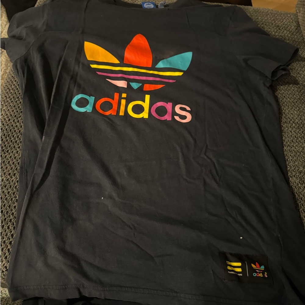 Adidas Pharrell Williams Black Tee with Colorful Logo